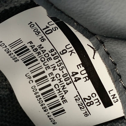 KAWS x Air Jordan 4 Retro 'Cool Grey' Sample