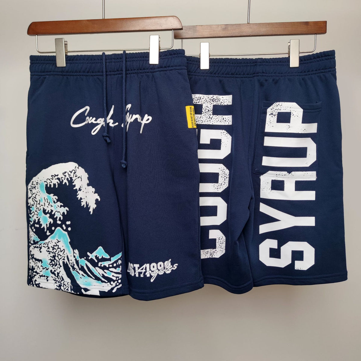 COUGH SYRUP Blue Wave Graphic Shorts