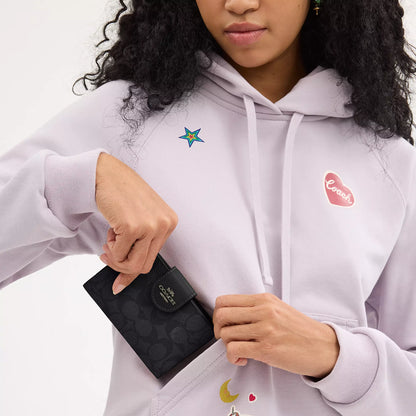 Coach Outlet Medium Corner Zip Wallet In Signature Canvas